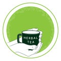 Hand holds mug of herbal tea. Healing herbal teas are used in alternative medicine