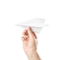 The hand holds a paper airplane. Close up. Isolated on a white background Royalty Free Stock Photo