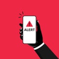 Hand holds phone with alert notification, scam and cyber security Royalty Free Stock Photo