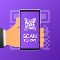 Hand holds phone with scan qr code to pay on screen. Phone on violet background. Vector illustration. Royalty Free Stock Photo