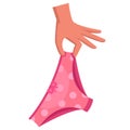 hand holds pink women panties with a bow.