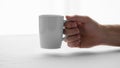 Setting is minimalistic highlighting the simplicity of the mug and Royalty Free Stock Photo