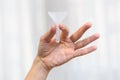Hand holds a saliva sample to detect covid19 antigens