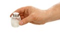 Hand holds salt cellar Royalty Free Stock Photo