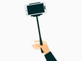 Hand holds a selfie stick with smartphones. Vector