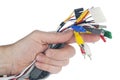 Hand holds set of cables with connectors