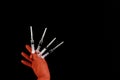 The hand holds several syringes Royalty Free Stock Photo