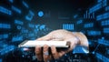 Hand Holding Smartphone Surrounded by Digital Interface with Data Charts, Graphs, and Statistics Illustrating Modern Royalty Free Stock Photo