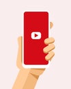Hand holds the smartphone with YouTube application on the screen. Flat vector modern phone mock-up illustration