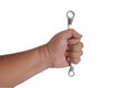 Hand holds a spanners isolated on white background.clipping