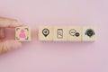 Hand holds wooden cubes with personalization icon standing with customer behaviors, contexual marketing concept, customer behavior