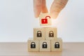 Hand holds wooden cubes with red unlocked key on top pyramid for finding solutions concept. Business problem solving and make Royalty Free Stock Photo