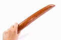 Hand holds wooden tanto Royalty Free Stock Photo