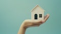 The hand with house model.AI generated image Royalty Free Stock Photo