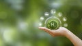 Hand of human holding green earth with the icon of H2 for Clean hydrogen energy concept.Environment, eco friendly industry and Royalty Free Stock Photo
