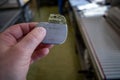 In a hand is an implantable defibrilator Royalty Free Stock Photo