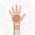 Hand with indian ethnic mehendi ornament