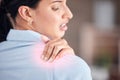 Hand, injury or shoulder pain with a business woman closeup in an office with posture problems. Back, anatomy and