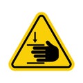 Hand injury sign. Hand crush sign. Hand Pinch Point Sign. Warning sign. Yellow triangle sign with hand icon and pressure inside.