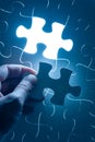 Hand insert jigsaw, conceptual image of business