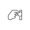 Hand inserting coin line icon