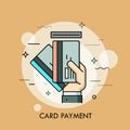 Hand inserting credit or debit card into slot. Payment method, money withdrawal, ATM service, transaction concept. Royalty Free Stock Photo