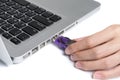 Hand Inserting usb memory stick Royalty Free Stock Photo