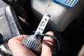 Hand installing H7 led headlight bulb with wires. Royalty Free Stock Photo