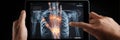 Hand Interacting With Anatomy Augmented Reality on Tablet in Medical Study Session Royalty Free Stock Photo
