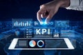 Hand Interacting with Digital KPI Dashboard Displaying Data Visualization and Business Analytics Over a Global Map Royalty Free Stock Photo