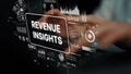 Hand Interacting with Digital Revenue Insights Graphics and Data Analysis Interface for Business Intelligence Royalty Free Stock Photo