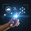 A hand interacting with a futuristic digital interface with cloud and data icons Royalty Free Stock Photo