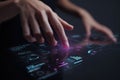 Hand interacting with a futuristic transparent touchscreen interface displaying data and digital elements Royalty Free Stock Photo