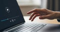 Hand interacting with video editing timeline on a laptop screen Royalty Free Stock Photo