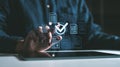 Hand interacts with digital checkmark and documents on dark background, symbolizing online document approval and business