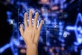 A hand interacts with a digital screen displaying multiple fingerprint icons