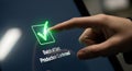 Close up of a finger touching a glowing green checkmark on a digital screen confirming a successful transaction or task completion Royalty Free Stock Photo