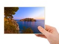 Hand and Island Sveti Stefan - Montenegro my photo Royalty Free Stock Photo