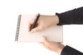 Hand keep notebook and other hand keep pen and wri Royalty Free Stock Photo