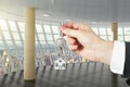 Hand with key from a new big office Royalty Free Stock Photo