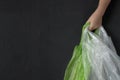 Hand kid holding plastic bags