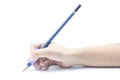 Hand of kids catching pencil by silicone, Helps to capture the pencil of children correctly Ergonomically correct writing. Royalty Free Stock Photo