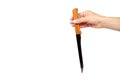 Hand with kitchen knife, home utensil, wooden handle