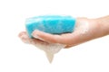 Hand and kitchen sponge in soapsuds Royalty Free Stock Photo