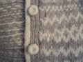 Hand knit neutral accessories. Traditional knitting and knitted buttons. Gray and white sheep wool. Serbian patterns. Zlatibor,