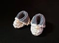 Hand knitted booties for newborn. Royalty Free Stock Photo