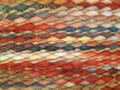 Hand knitted colorful wool texture. Background of handmade cotton arabic fabrics. Chill out. Colorful wool blankets. Arabic