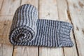 Hand knitted gray scarf. Royalty Free Stock Photo