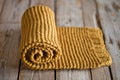 Hand knitted yellow scarf.