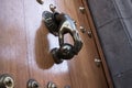 Hand knockers. Wooden door Royalty Free Stock Photo